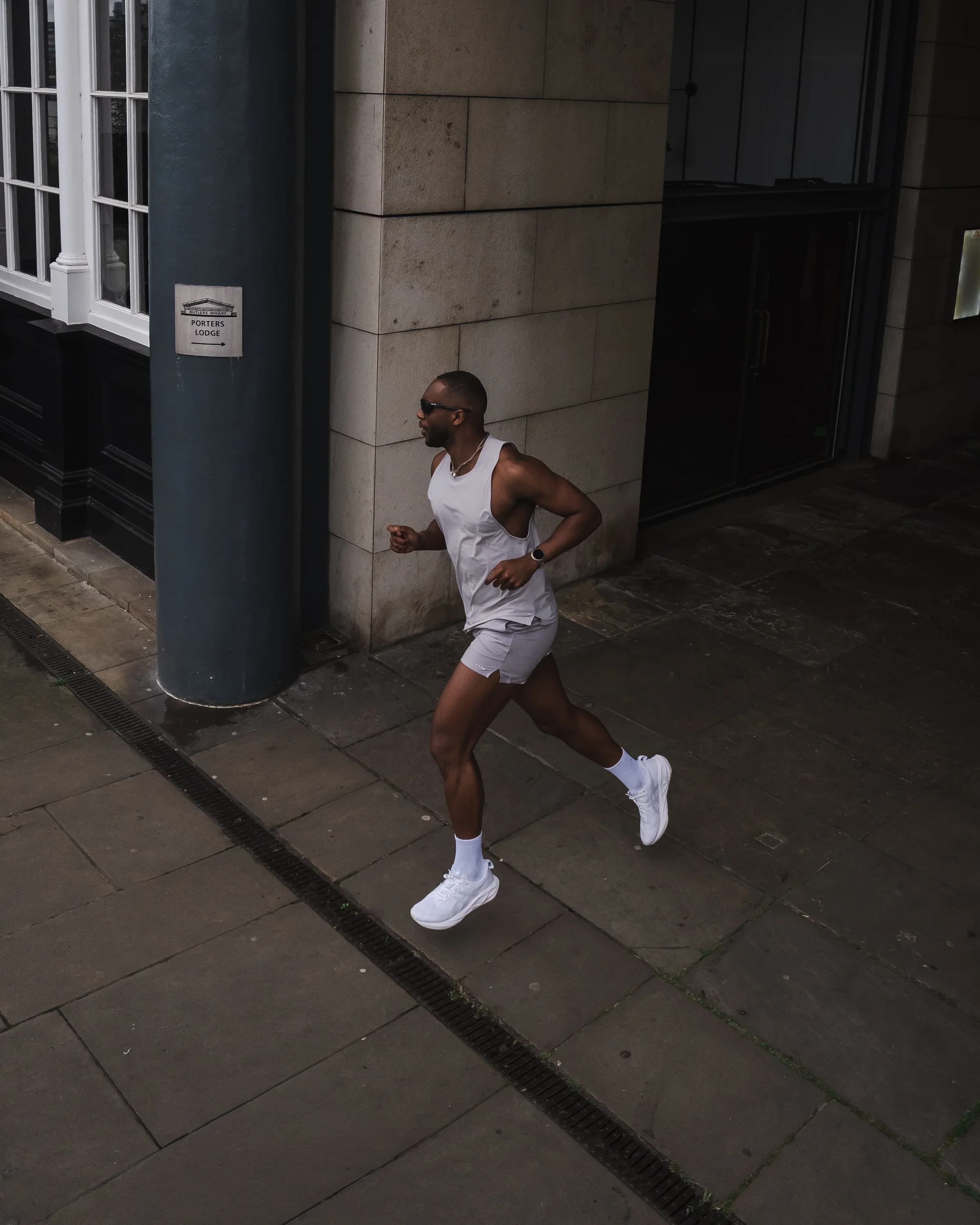 LSKD campaign photo: runner on a city street at night